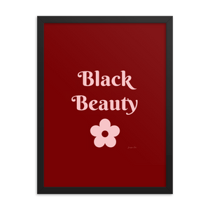 A monochrome red poster with text that reads "Black Beauty", inside of a black frame