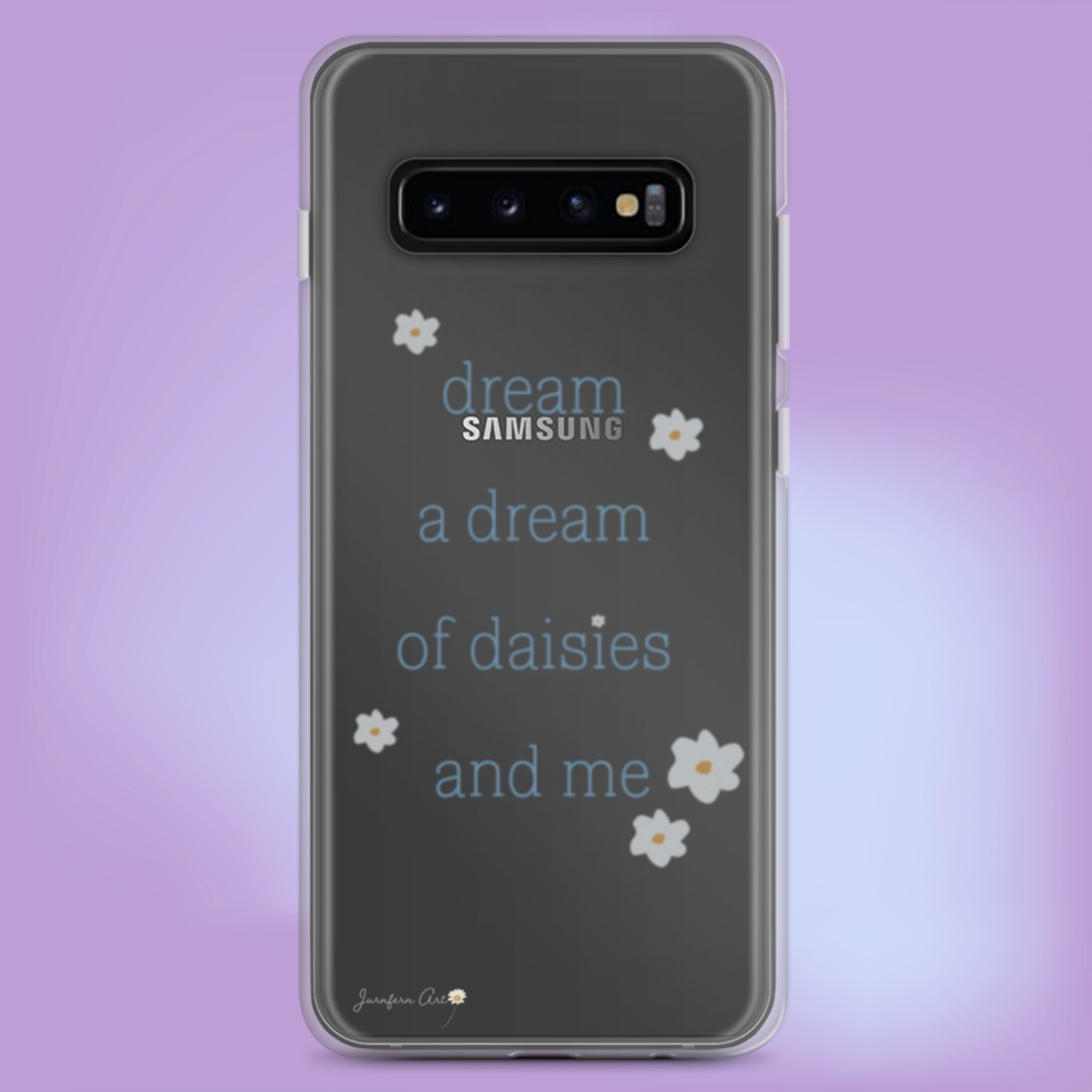 A transparent Samsung Galaxy S10 phone case with blue text on it that reads "dream a dream of daisies and me" surrounded by small daisies