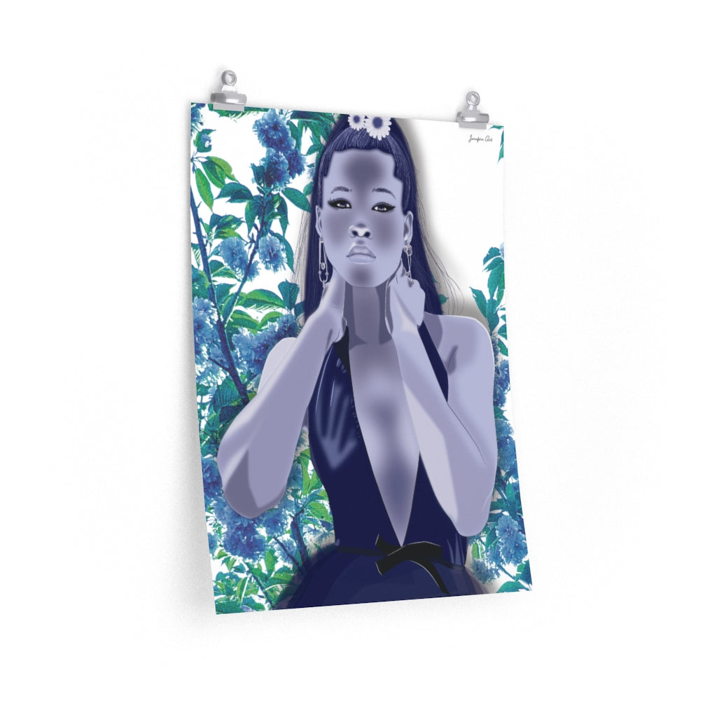 A 18 by 24 inch poster with a monochrome blue graphic illustration of Storm Reid posing in deep V-neck dress, with a photo of blue flowers in the background
