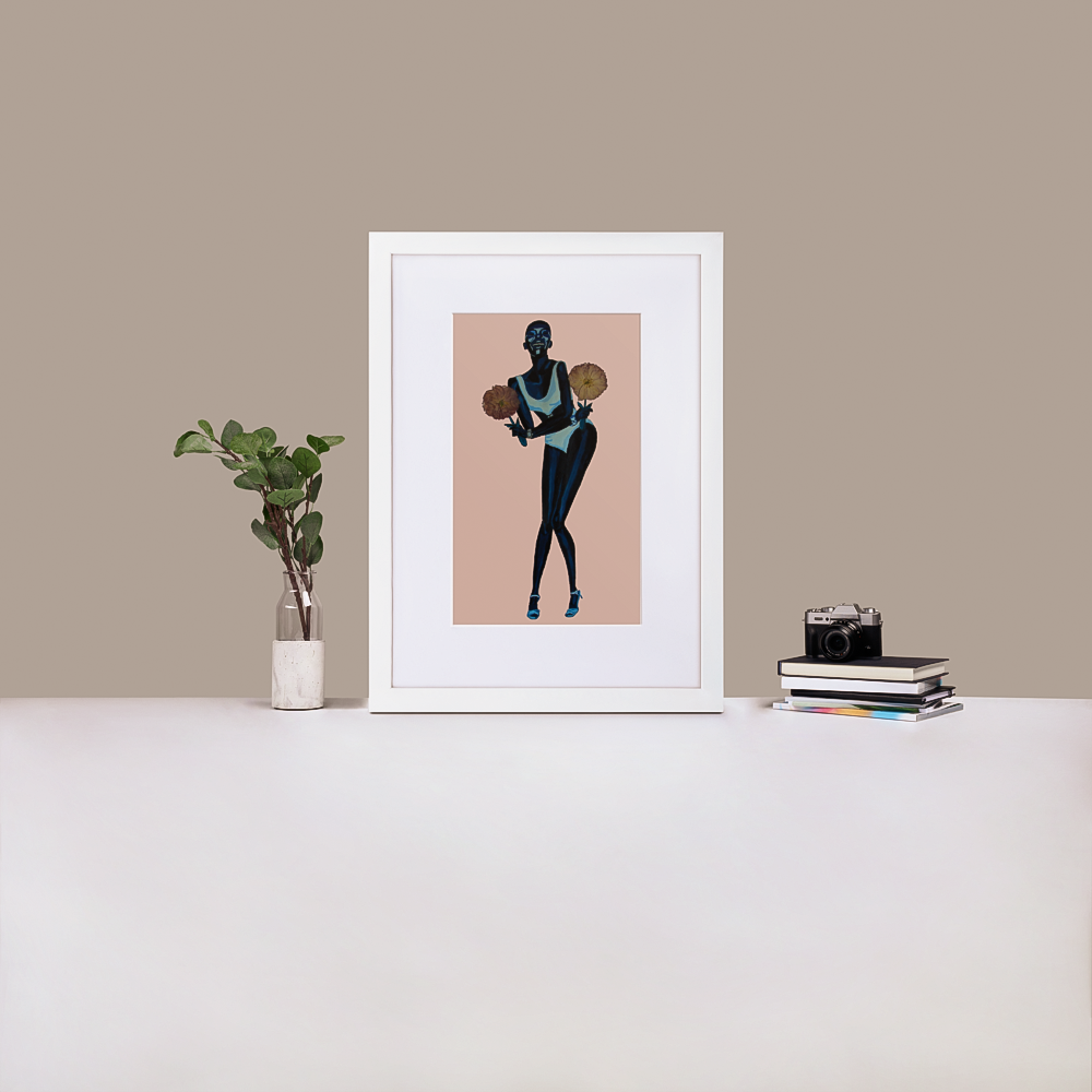 Monochrome painting of Black supermodel Adut Akech wearing a Chanel swimsuit and holding pressed flowers with a light pink background in a white frame with matting, standing on a desk with a plant and books