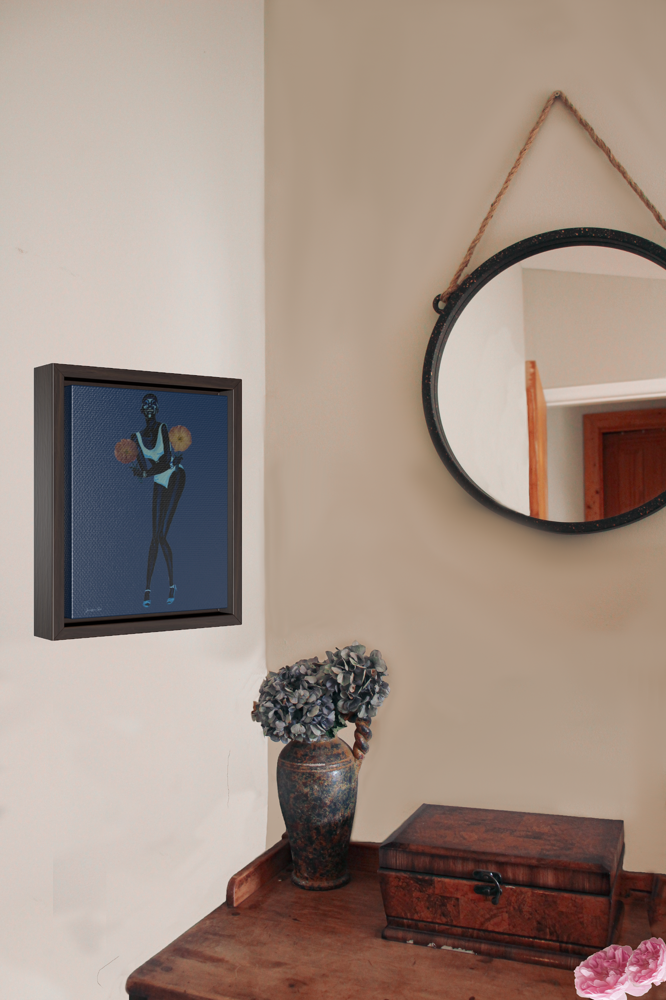 Framed wall art canvas in Dark Blue by Jurnfern Art, of model Adut Akech, hanging on bedroom wall