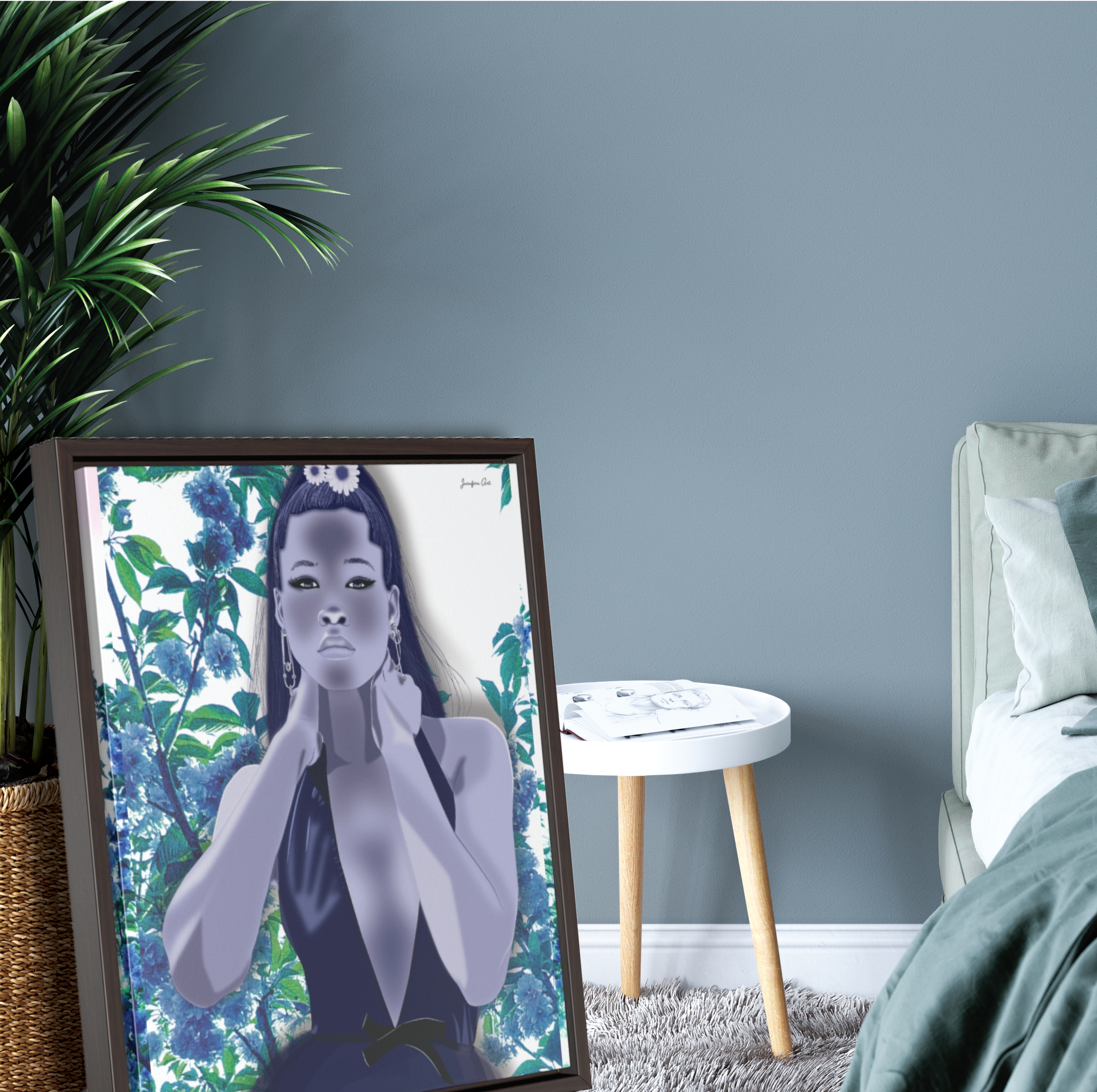 A large framed canvas illustration of actress Storm Reid posing in a blue deep-neck dress, with a blue floral background. The canvas is leaning up against a potted plant next to a bed
