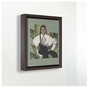 A small framed canvas illustration with a green background and a digital illustration of actress Storm Reid posing in a chair and wearing a white blouse and black trousers, with a cut-out photo of leaves behind her