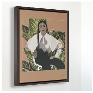 A large framed canvas illustration with an orange background and a digital illustration of actress Storm Reid posing in a chair and wearing a white blouse and black trousers, with a cut-out photo of leaves behind her